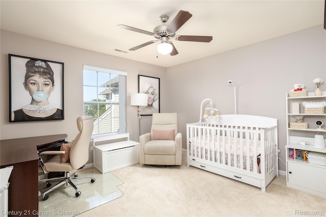 29611 Fox Run Cir, Warren, MI 48092 - carpeted bedroom featuring a desk, a crib, and ceiling fan