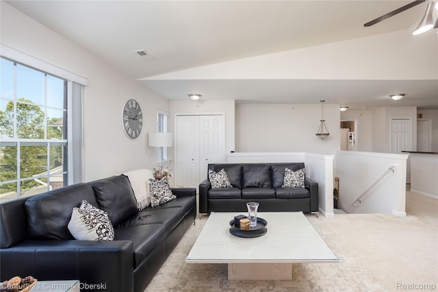29611 Fox Run Cir, Warren, MI 48092 - living room featuring vaulted ceiling, carpet, and a ceiling fan