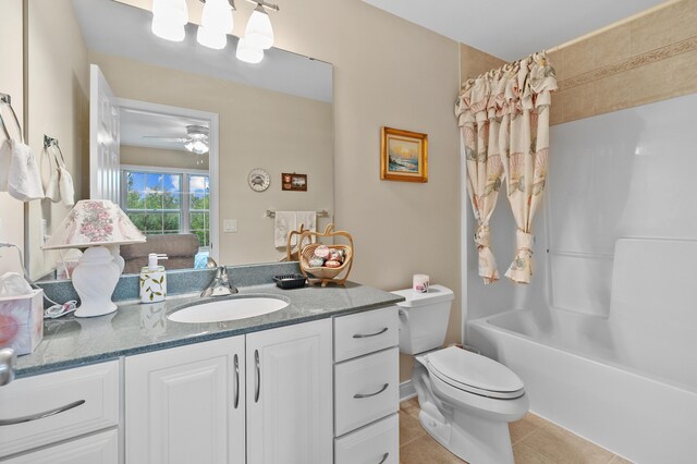 6380 Mcgillicuddy Ln, Portage, MI 49024 - full bathroom featuring vanity, tile patterned floors, shower / bath combo, and a ceiling fan