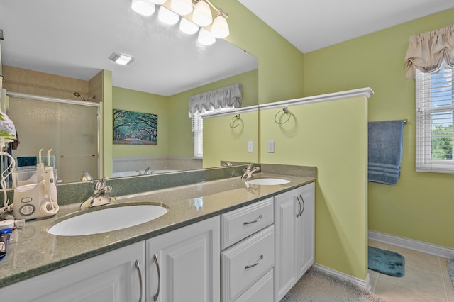 6380 Mcgillicuddy Ln, Portage, MI 49024 - bathroom with a stall shower, a bath, tile patterned floors, and double vanity