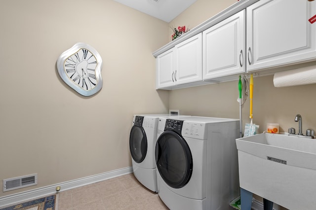 6380 Mcgillicuddy Ln, Portage, MI 49024 - washroom with washer and dryer and cabinet space