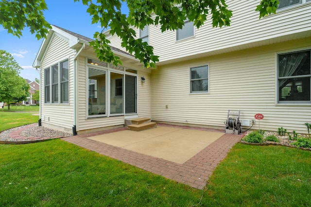 6380 Mcgillicuddy Ln, Portage, MI 49024 - back of property with a patio and a lawn