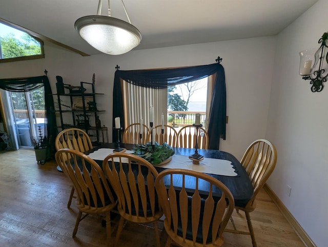 2740 Booth Rd, Au Gres, MI 48703 - dining space featuring healthy amount of natural light and wood finished floors