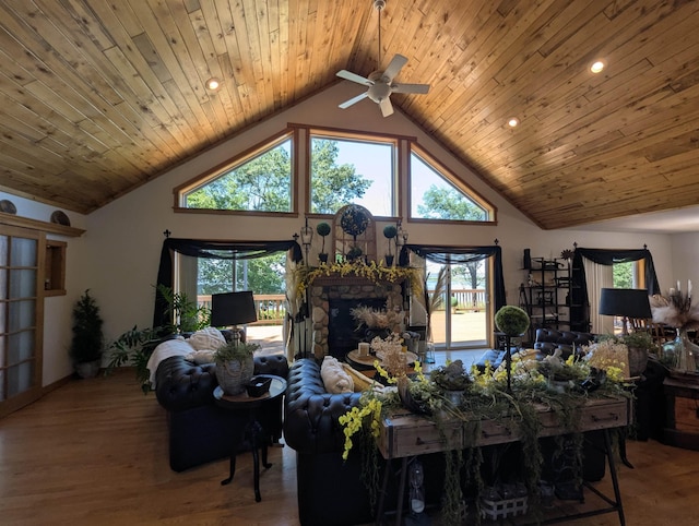 2740 Booth Rd, Au Gres, MI 48703 - living area with ceiling fan, high vaulted ceiling, wood finished floors, recessed lighting, and plenty of natural light