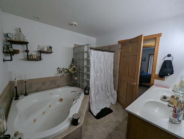 2740 Booth Rd, Au Gres, MI 48703 - bathroom with a whirlpool tub, tiled shower, double vanity, and tile patterned flooring
