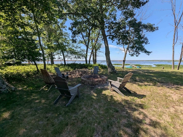 2740 Booth Rd, Au Gres, MI 48703 - view of yard with a fire pit and a water view