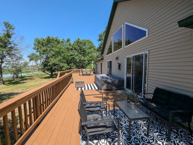 2740 Booth Rd, Au Gres, MI 48703 - wooden terrace with grilling area, an outdoor hangout area, and a water view