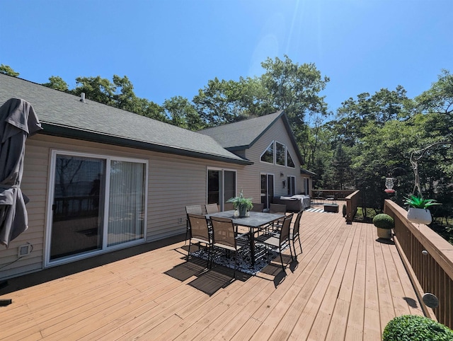 2740 Booth Rd, Au Gres, MI 48703 - wooden terrace featuring outdoor dining area and grilling area