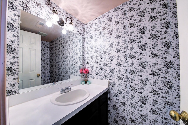 6397 Hunter Pointe St, Westland, MI 48185 - bathroom with wallpapered walls and vanity
