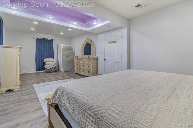 3901 Westpoint St, Dearborn Heights, MI 48125 - bedroom featuring wood finished floors, recessed lighting, and a raised ceiling