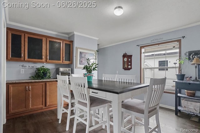 26317 Cherokee E, Flat Rock, MI 48134 - dining area featuring dark wood finished floors and crown molding