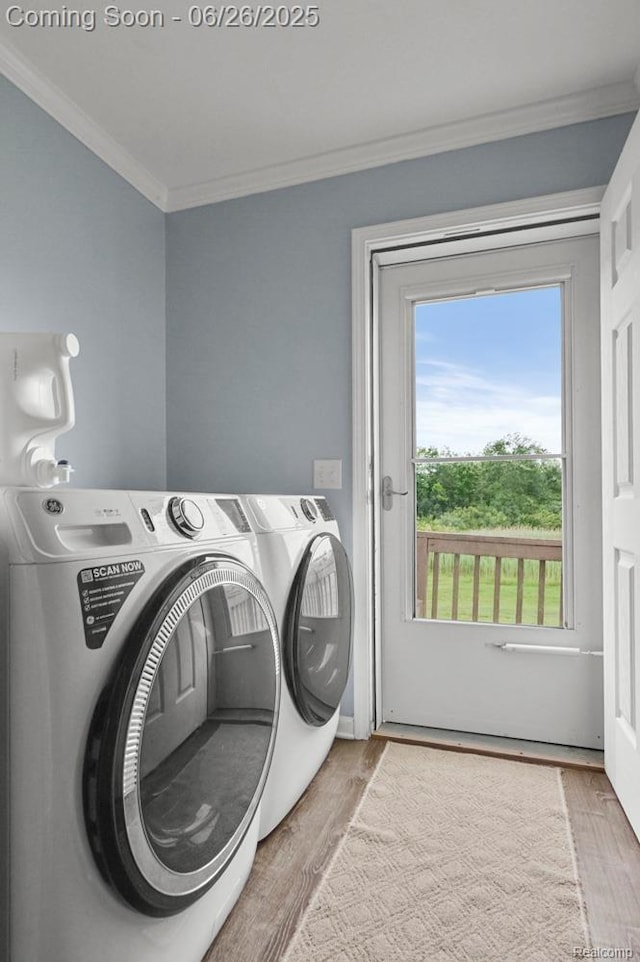 26317 Cherokee E, Flat Rock, MI 48134 - washroom with washer and clothes dryer, wood finished floors, and crown molding