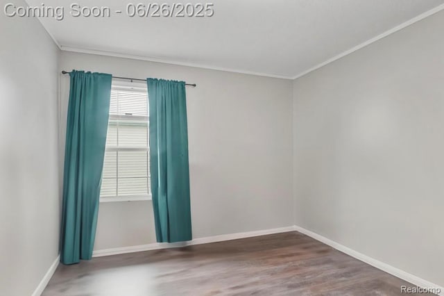 26317 Cherokee E, Flat Rock, MI 48134 - empty room with crown molding and wood finished floors
