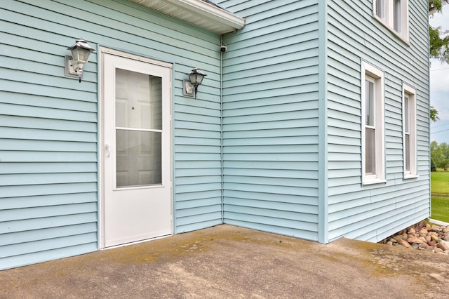 8075 Caine Rd, Millington, MI 48746 - entrance to property with a patio