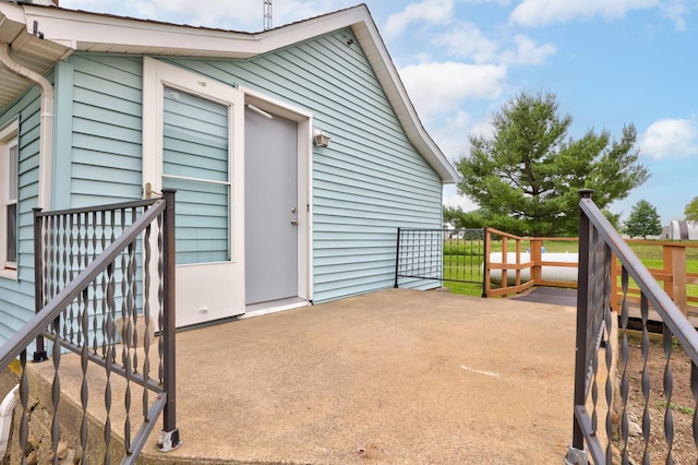8075 Caine Rd, Millington, MI 48746 - wooden deck featuring a patio area
