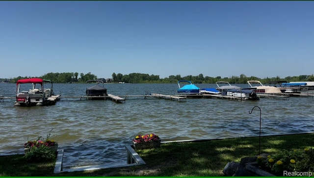 14214 Eastview Dr, Fenton, MI 48430 - dock area featuring a water view