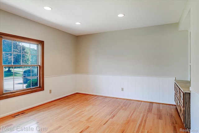 4280 Snoal Ln, Shelby Twp, MI 48316 - spare room featuring light wood-type flooring, wainscoting, and recessed lighting