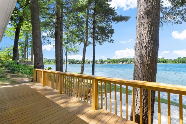 12915 S Englewright Dr, Sand Lake, MI 49343 - wooden deck featuring a water view