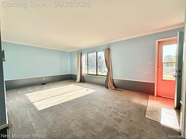 8588 Tim Tam Trl, Flushing, MI 48433 - empty room with crown molding and carpet