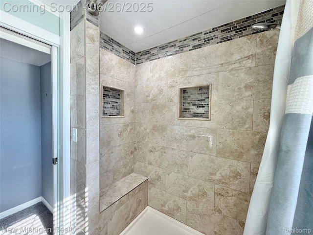 8588 Tim Tam Trl, Flushing, MI 48433 - bathroom featuring tiled shower and baseboards