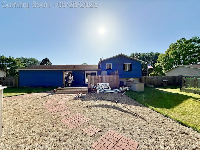 8588 Tim Tam Trl, Flushing, MI 48433 - rear view of house with a deck