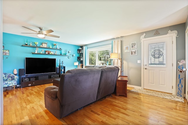 5255 E Holland Rd, Saginaw, MI 48601 - living room with light wood finished floors and ceiling fan