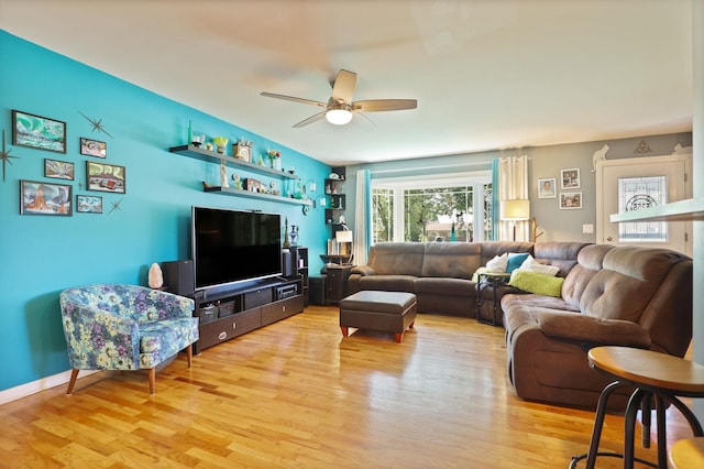 5255 E Holland Rd, Saginaw, MI 48601 - living area featuring a ceiling fan and light wood finished floors
