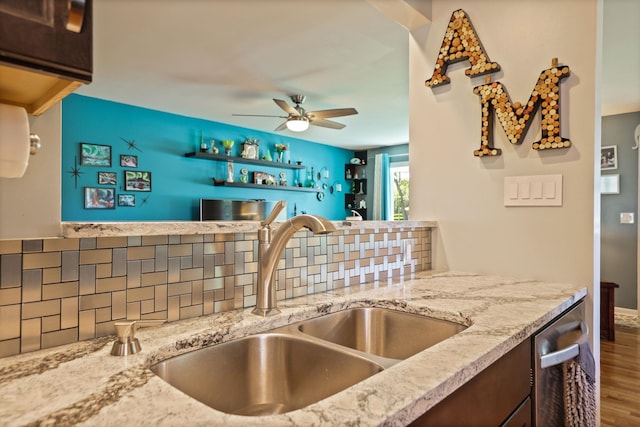 5255 E Holland Rd, Saginaw, MI 48601 - kitchen featuring tasteful backsplash, ceiling fan, wood finished floors, and light stone countertops