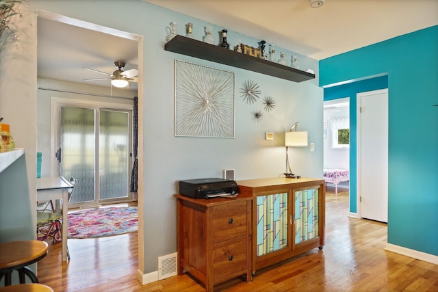 5255 E Holland Rd, Saginaw, MI 48601 - hall with healthy amount of natural light, wood finished floors, and an office area