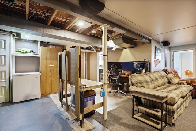 5255 E Holland Rd, Saginaw, MI 48601 - unfinished below grade area with refrigerator and an office area