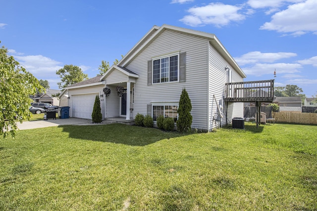 613 Silver Birch St, Howard City, MI 49329 - split level home featuring a garage and driveway