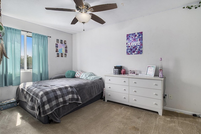 613 Silver Birch St, Howard City, MI 49329 - bedroom featuring light colored carpet and a ceiling fan