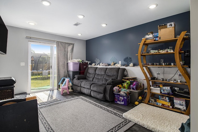 613 Silver Birch St, Howard City, MI 49329 - living room featuring wood finished floors and recessed lighting