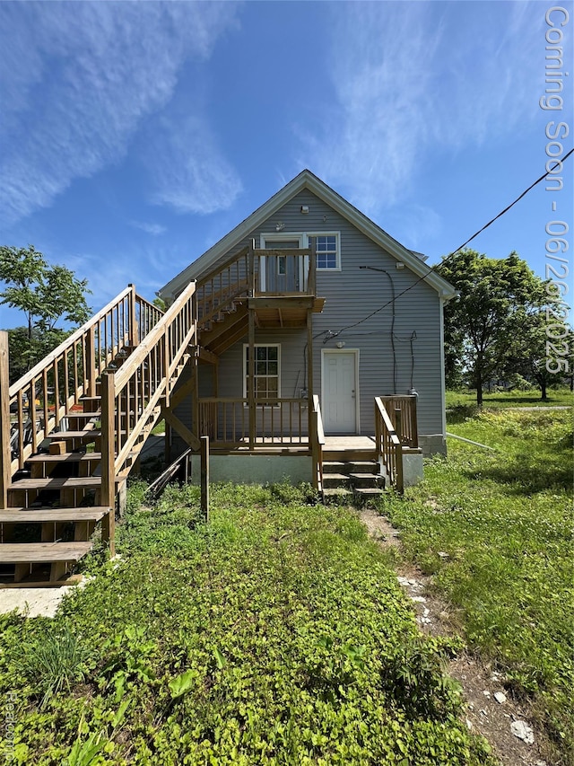 2063 Meade St, Hamtramck, MI 48212 - rear view of house with stairway and a deck