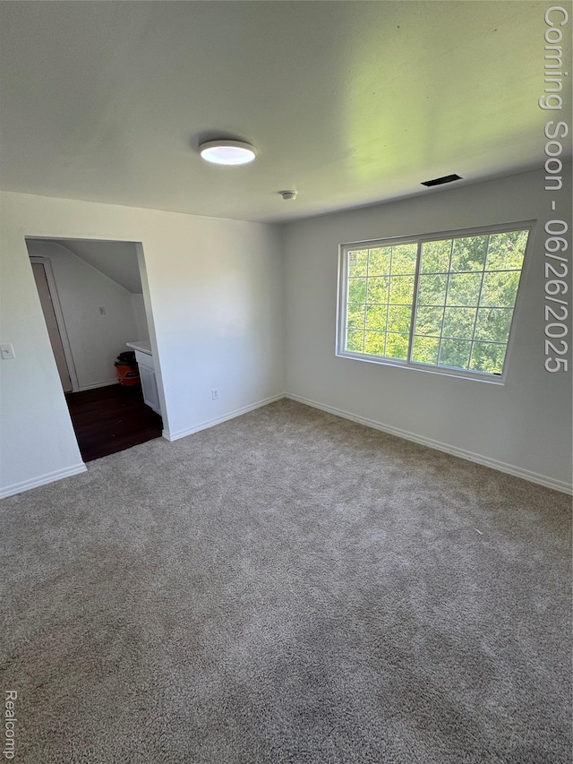 2063 Meade St, Hamtramck, MI 48212 - carpeted empty room with baseboards