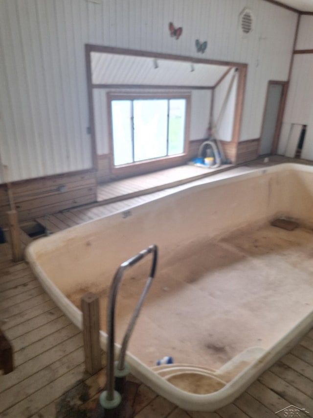 401 W Main Rd, Cement City, MI 49233 - bathroom featuring wood finished floors