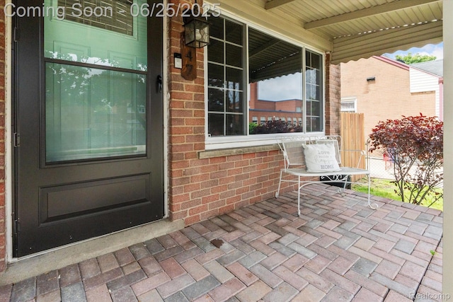 647 Farnham Ave, Lincoln Park, MI 48146 - entrance to property featuring a porch and brick siding