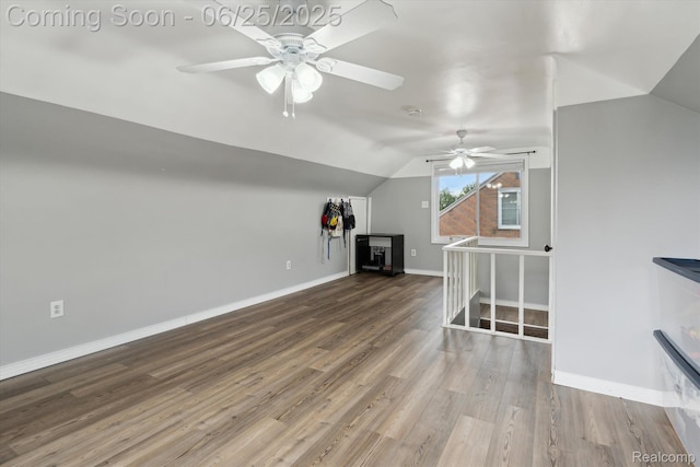 647 Farnham Ave, Lincoln Park, MI 48146 - unfurnished living room featuring ceiling fan, wood finished floors, and lofted ceiling