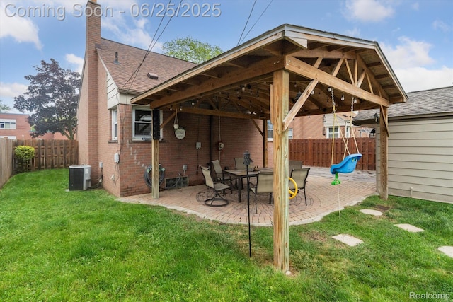 647 Farnham Ave, Lincoln Park, MI 48146 - rear view of house featuring a shingled roof, a patio, a chimney, and a fenced backyard