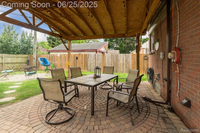 647 Farnham Ave, Lincoln Park, MI 48146 - fenced backyard with outdoor dining area and a patio area