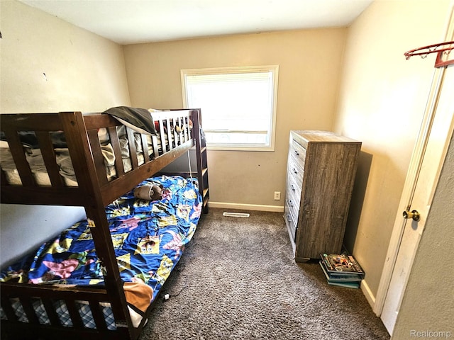 356 Spruce St, Mount Morris, MI 48458 - bedroom with dark colored carpet and baseboards