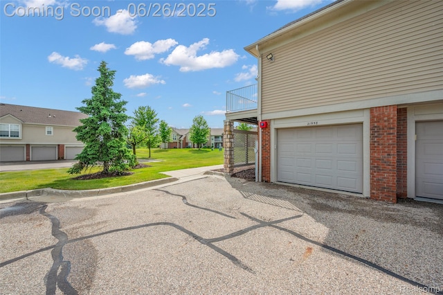 21958 Hartford Way, Macomb, MI 48042 - garage featuring a residential view