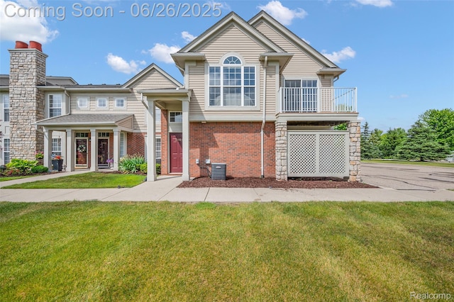 21958 Hartford Way, Macomb, MI 48042 - view of front of property with a front lawn and brick siding
