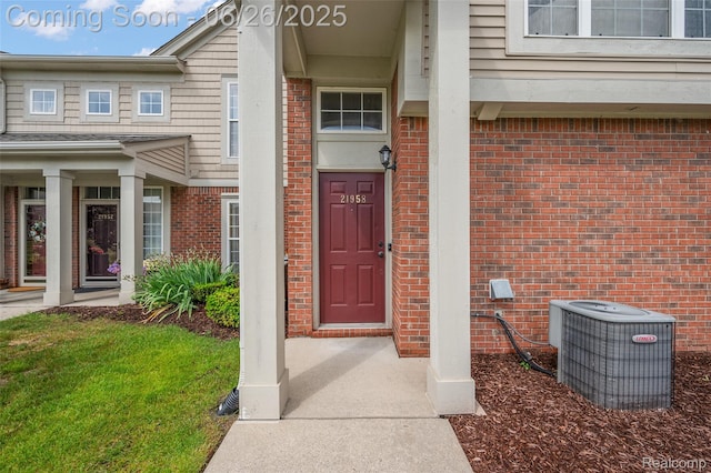 21958 Hartford Way, Macomb, MI 48042 - doorway to property with brick siding