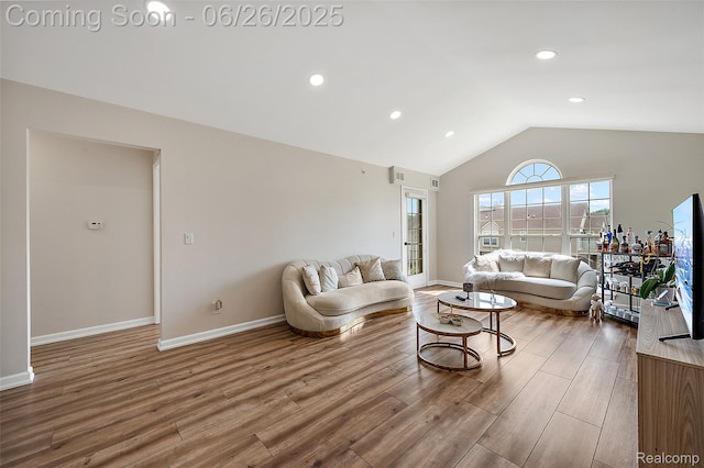 21958 Hartford Way, Macomb, MI 48042 - living area featuring lofted ceiling, wood finished floors, and recessed lighting