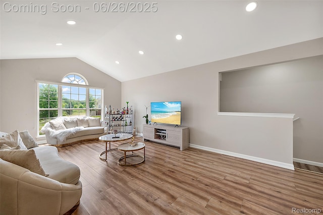 21958 Hartford Way, Macomb, MI 48042 - living area featuring wood finished floors, lofted ceiling, and recessed lighting