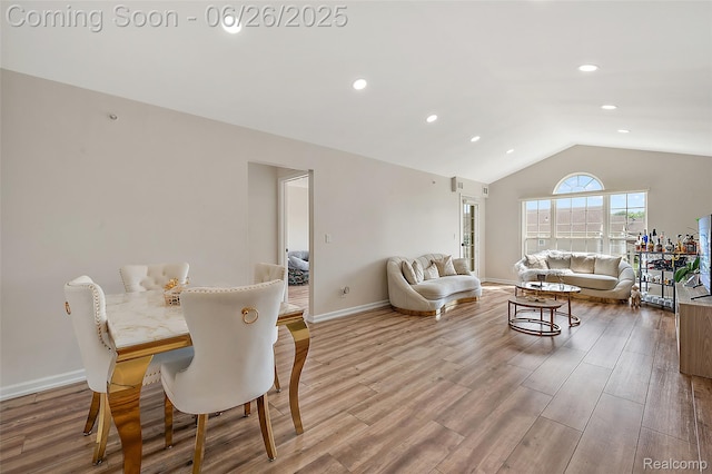 21958 Hartford Way, Macomb, MI 48042 - dining room featuring lofted ceiling, wood finished floors, and recessed lighting
