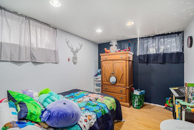 2126 Covert Rd, Burton, MI 48509 - bedroom with light wood finished floors and recessed lighting