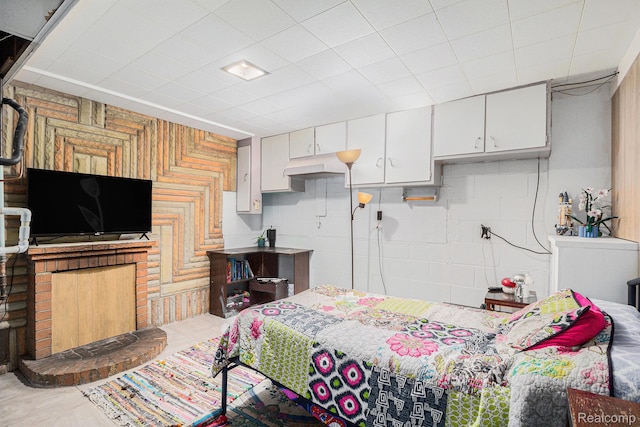 2126 Covert Rd, Burton, MI 48509 - bedroom featuring a fireplace