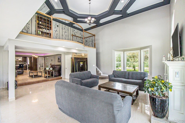 7471 Brewer Rd, Flint, MI 48507 - living room with a chandelier, a high ceiling, stairway, coffered ceiling, and beam ceiling
